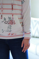 Sleeve detail on floral sweatshirt